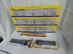 A Bachmann HO scale plastic Union Pacific Locomotive 6922, part boxed along with three Genesis HO