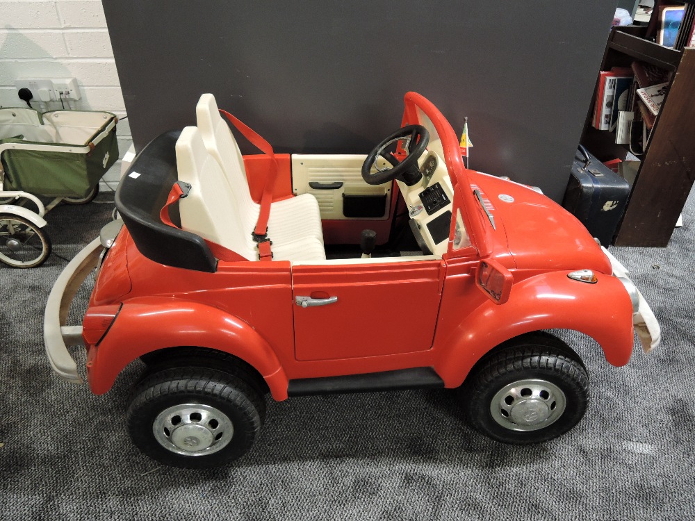 A 1980's/1990's Peg Perigo Magica battery operated childs model car, VW Beetle Cabriolet in red with