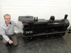 A unique hand made wooden 1:4 scale LMS 0-6-0 Loco & Tender 3435 having lawn mower powered engine,