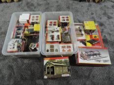 A shelf holding two boxes of Hornby 00 gauge Building and similar Accessories including Station