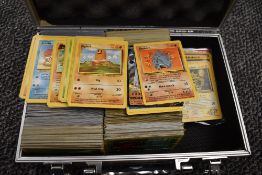 A large collection of Pokemon Cards mainly unlimited including 5 Trainer 1st edition cards Energy