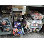 A shelf of Micro Machines Star Wars Accessories including Millennium Falcon, The Death Star, Darth