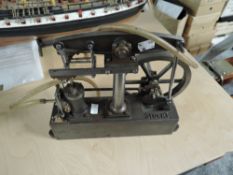A Stuart Turner Live Steam Beam Engine on cast metal base, diameter of flywheel 17.5cm, height of
