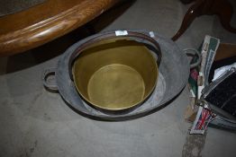 A vintage brass jam pan and small zinc bath