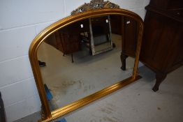 A modern gilt frame overmantel mirror