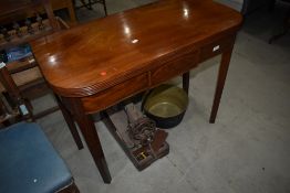 A 19th Century mahogany and inlaid fold over tea table, width approx. 92cm