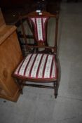 An Edwardian style mahogany bedroom chair