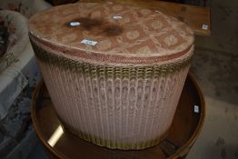 A vintage Lloyd Loom linen basket