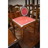 An Edwardian mahogany corner chair having line inlay decoration