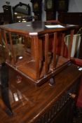 An early to mid 20th Century table top revolving bookcase
