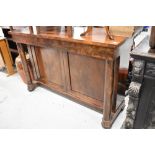 A Victorian mahogany sideboard/console having column supports and panel base