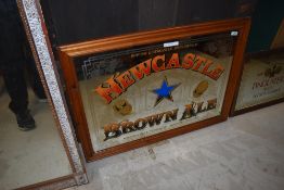 An advertising mirror, Newcastle Brown Ale, approx. 90 x 66cm