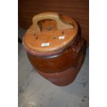 A vintage part glazed earthenware egg crock having wooden lid