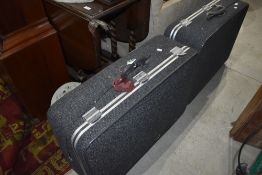 A pair of Skyway tweed lined suitcases