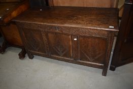 A traditional oak bedding box in a period style