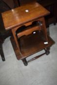 An Arts and Crafts oak stool or occasional table and a traditional coffin stool type side table