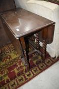 An early 20th Century oak twist gateleg table