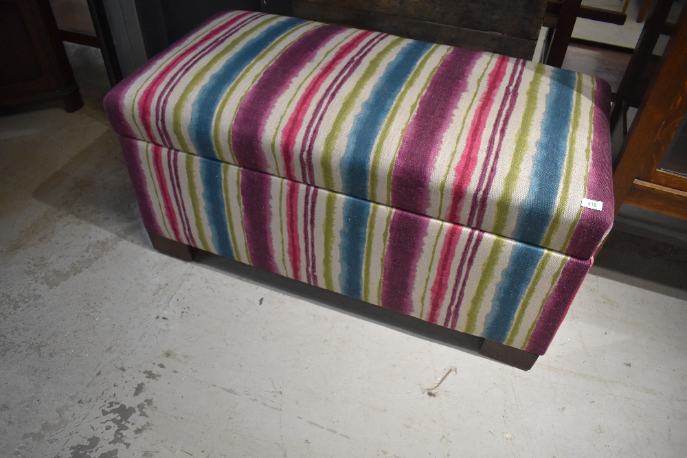 A traditional upholstered bedding box