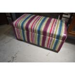A traditional upholstered bedding box