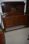 An early 20th Century oak mirror back sideboard having twist leg and mirror supports, width
