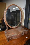 A 19th Century mahogany toilet mirror having drawer base