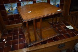 An early 20th Century oak table top revolving bookcase