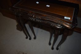 A reproduction period style nest of three tables
