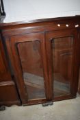 A Victorian mahogany bookcase top on later plinth, width approx. 103cm