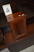 An Edwardian mahogany smokers or stationery cabinet, made by Frank Howard of Northampton, Cabinet