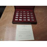 A set of John Pinches Elizabeth Our Queen 25 Silver Ingots in wooden presentation case with