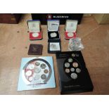 A small collection of GB Coins, Brilliant Uncirultaed 2000 Coin Set and Royal Shield of Arms Set
