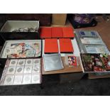 A collection of World Coins and Banknotes in albums an loose along with a 2014 Coin Year Book