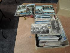 A box and two albums of World Postcards, box contains mainly vintage cards, some good cards seen,