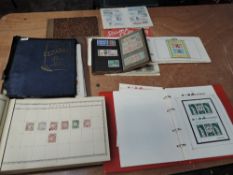 A collection of World Stamps, mint and used in seven large and small albums