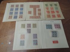 A collection of George V South Africa Stamps, all mint, in blocks of four, officials, halfpenny to 5