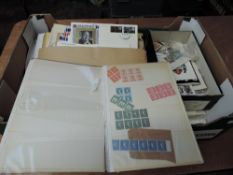 A box of GB & World Covers and Stamps also a UN album of the 40th Anniversary of the Human Rights