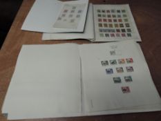 A folder of Rhodesia, Southern Rhodesia and Nyasaland Stamps, all Queen Elizabeth II, all used, many