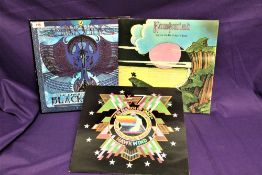 A lot of three albums by Hawkwind