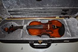 An eighth size violin, approx 10in two piece back, nice quality and condition, labelled for Hanson