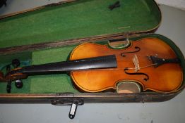 A traditional violin, having 2 piece back, approx 14in, labelled The Harrow, School Violin Outfit (H