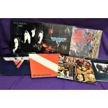 A lot of seven albums by Van Halen / David Lee Roth