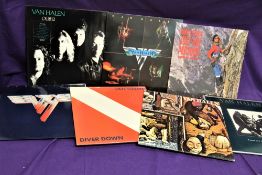 A lot of seven albums by Van Halen / David Lee Roth