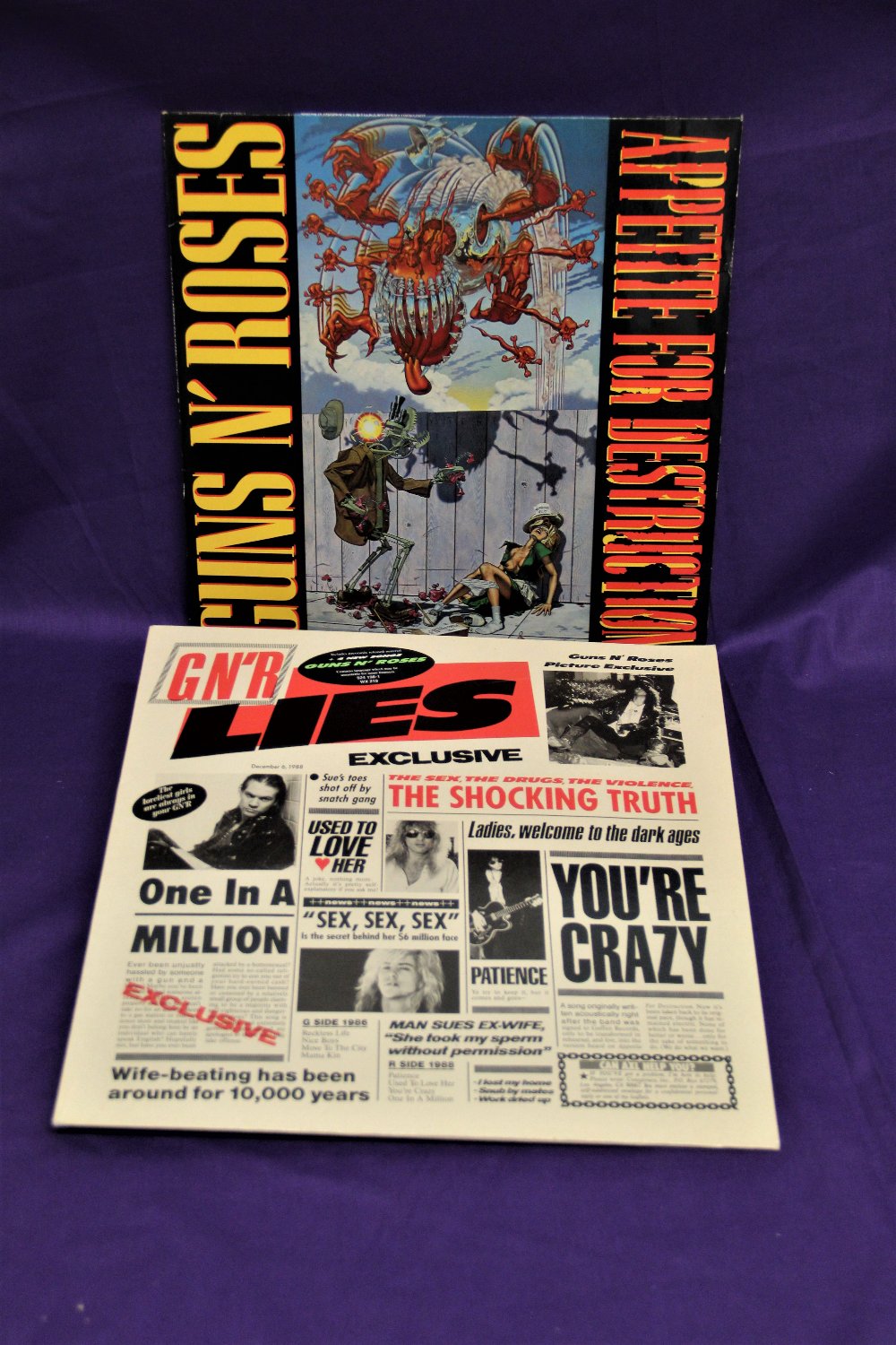 A lot of two original albums by Guns ' n ' Roses with the controversial sleeve on offer here