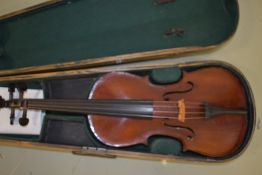 An early 20th Century violin, having 2 piece back, approx 14in, labelled for J G Murdoch and Co (