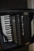 A Weltmeister Rubin Accordion 60/30/3, in plush lined hard case