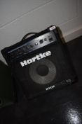 A Hartke Kick back 10, bass amp/monitor model HA1200 (120watts)