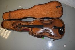 A traditional violin having one piece back, approx 14' with period wooden case, no label