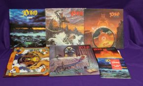 A lot of five albums by hard rock / metal band Dio - also in this lot picture disc 45's