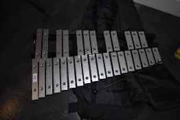 A glockenspiel in soft carry case, with beaters