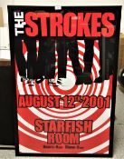 A Strokes gig poster - framed and in excellent condition - measures 65 x 95